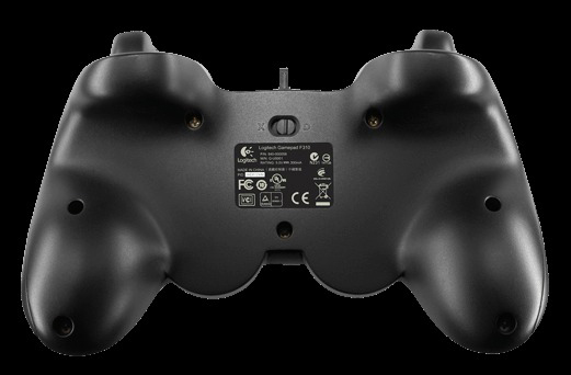 Back of a black Logitech F310 gamepad. Buttons, serial numbers and a switch are visible.