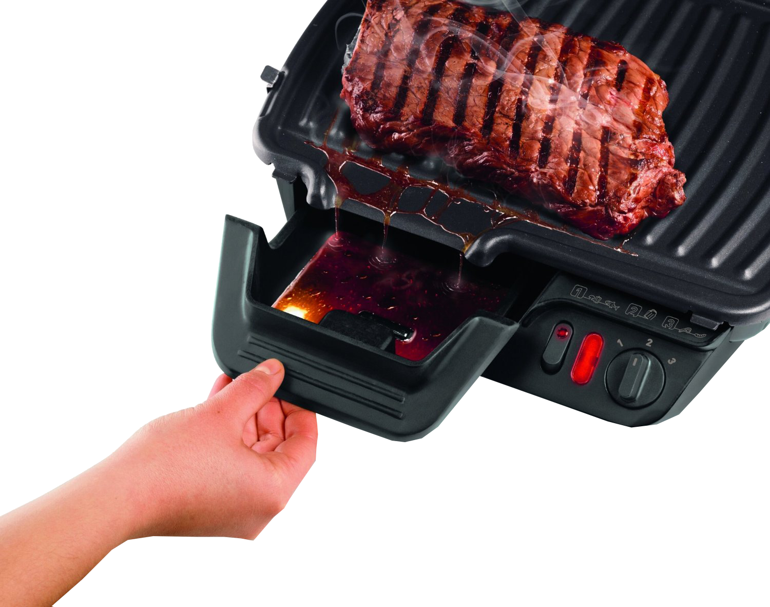 Egy steak egy grillen, tálcával a levek gyűjtésére, kézzel húzva.
