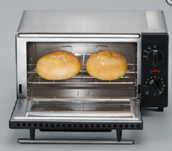 Toaster oven with two rolls inside, open door, and a silver finish.
