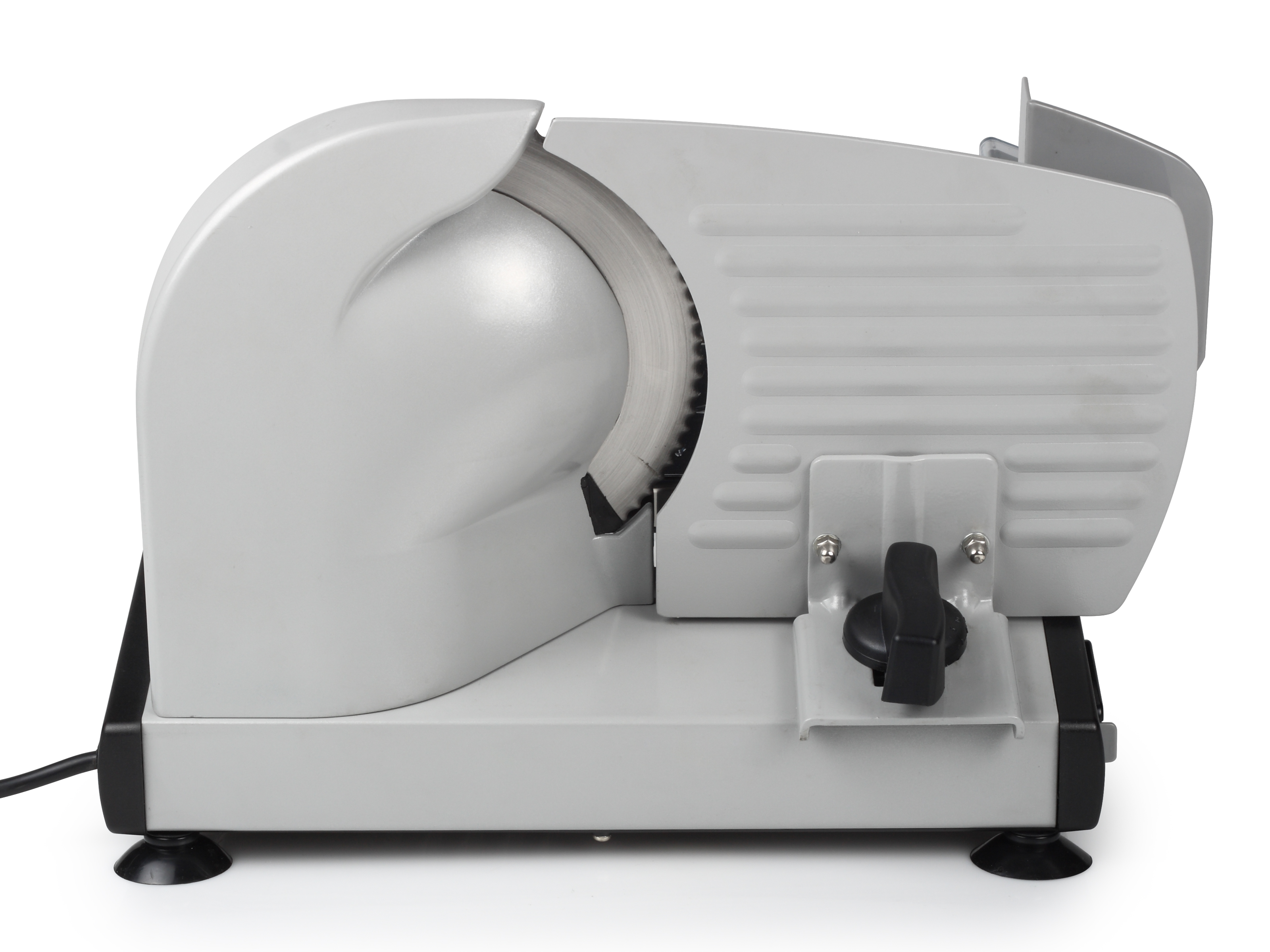 A grey meat slicer on a white surface. Circular blade visible. Black handle and feet.