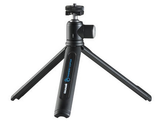 Black tripod with three legs, a ball head, and a handle with the brand name 'Magnesit Copter'.