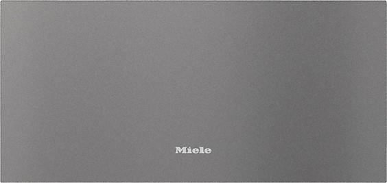 Einfache graue Oberfläche mit dem Wort "Miele" in Weiß unten.
