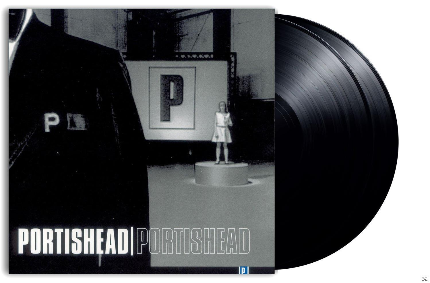 A black and white album cover with two vinyl records. Text says 'PORTISHEAD'.