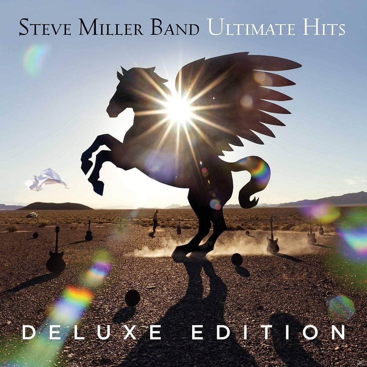 Albumhoes toont een zwart silhouet van een gevleugeld paard met de zon erachter. Deluxe Edition.