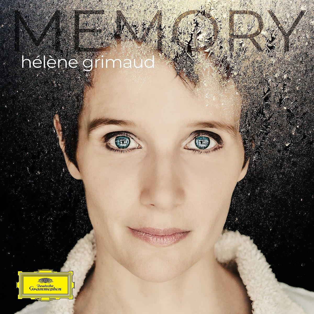 Albumhoes met een vrouwen gezicht en het woord Memory.