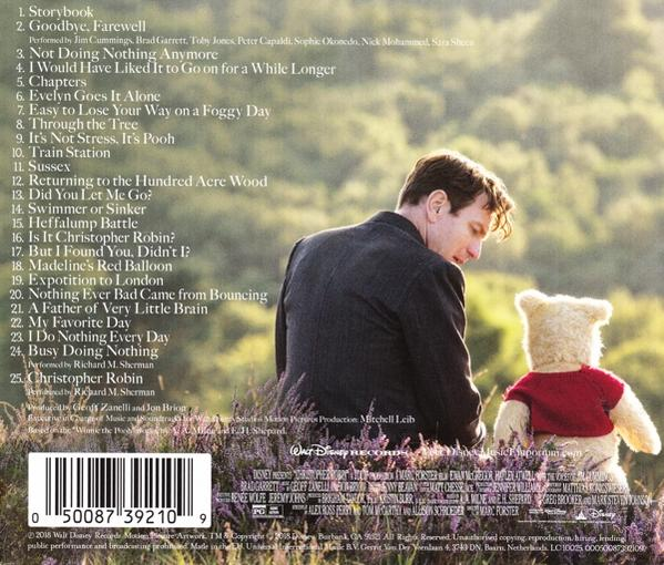 Dos d'un CD de Winnie l'ourson avec un homme et Pooh.