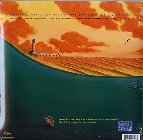 Pochette de disque vinyle avec une scène côtière, avec un phare et un coucher de soleil.