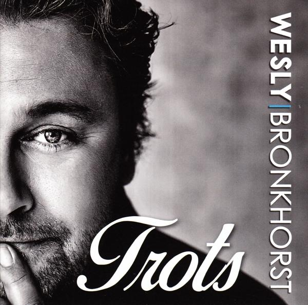 Pochette d'album en noir et blanc de Wesly Bronkhorst. Gros plan du visage avec le mot 'Trots'.