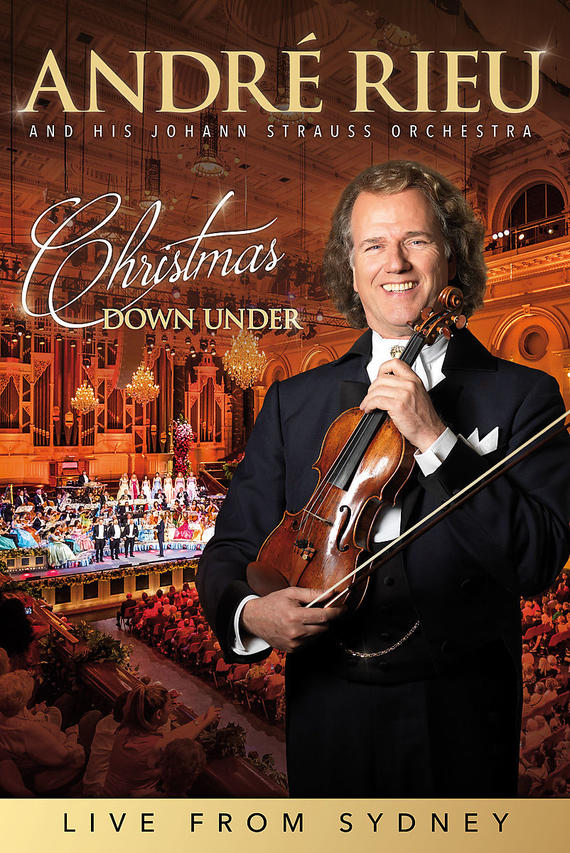 André Rieu avec violon devant un orchestre. Le texte sur la couverture est 'Christmas Down Under'.