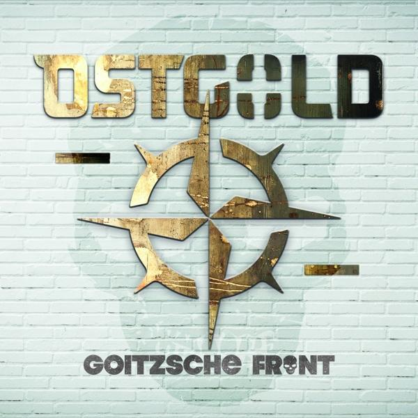 Ein Logo der Band Goitzsche Front auf einer weißen Backsteinmauer.