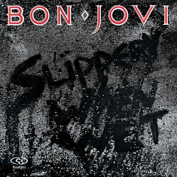 Bon Jovi album borító. Fekete háttér fehér fröccsenő hatással és szöveggel.