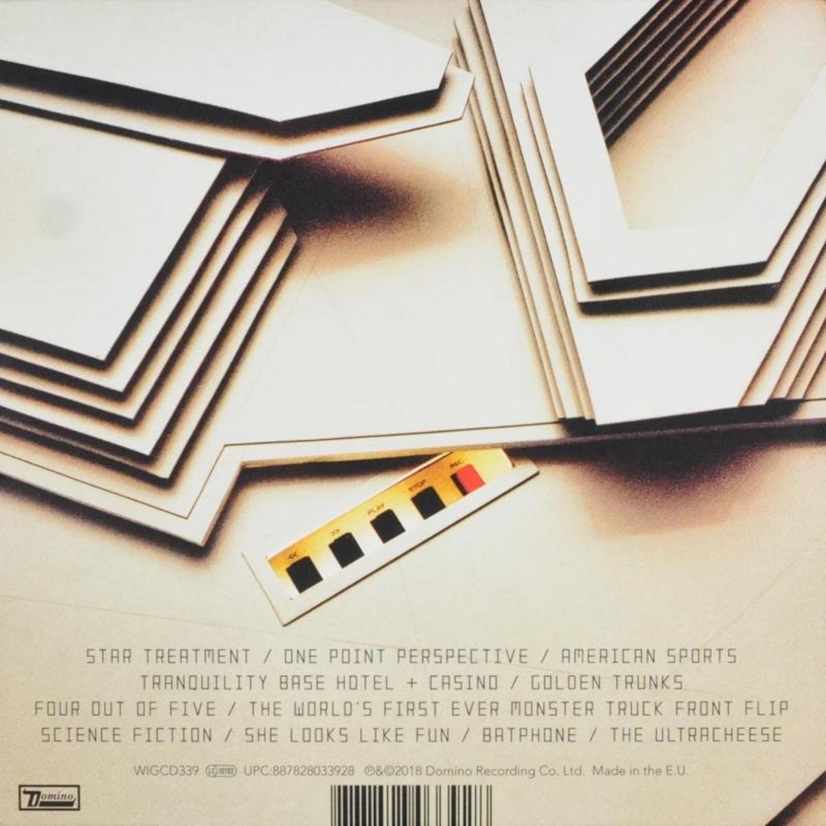 Album borító fehér és fekete geometriai formákkal és egy kis vezérlőpanellel. Fekete szöveg.