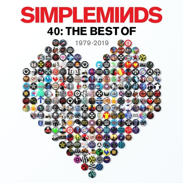 Simple Minds albumhoes, hartvormig ontwerp van kleurrijke knoppen, witte achtergrond.