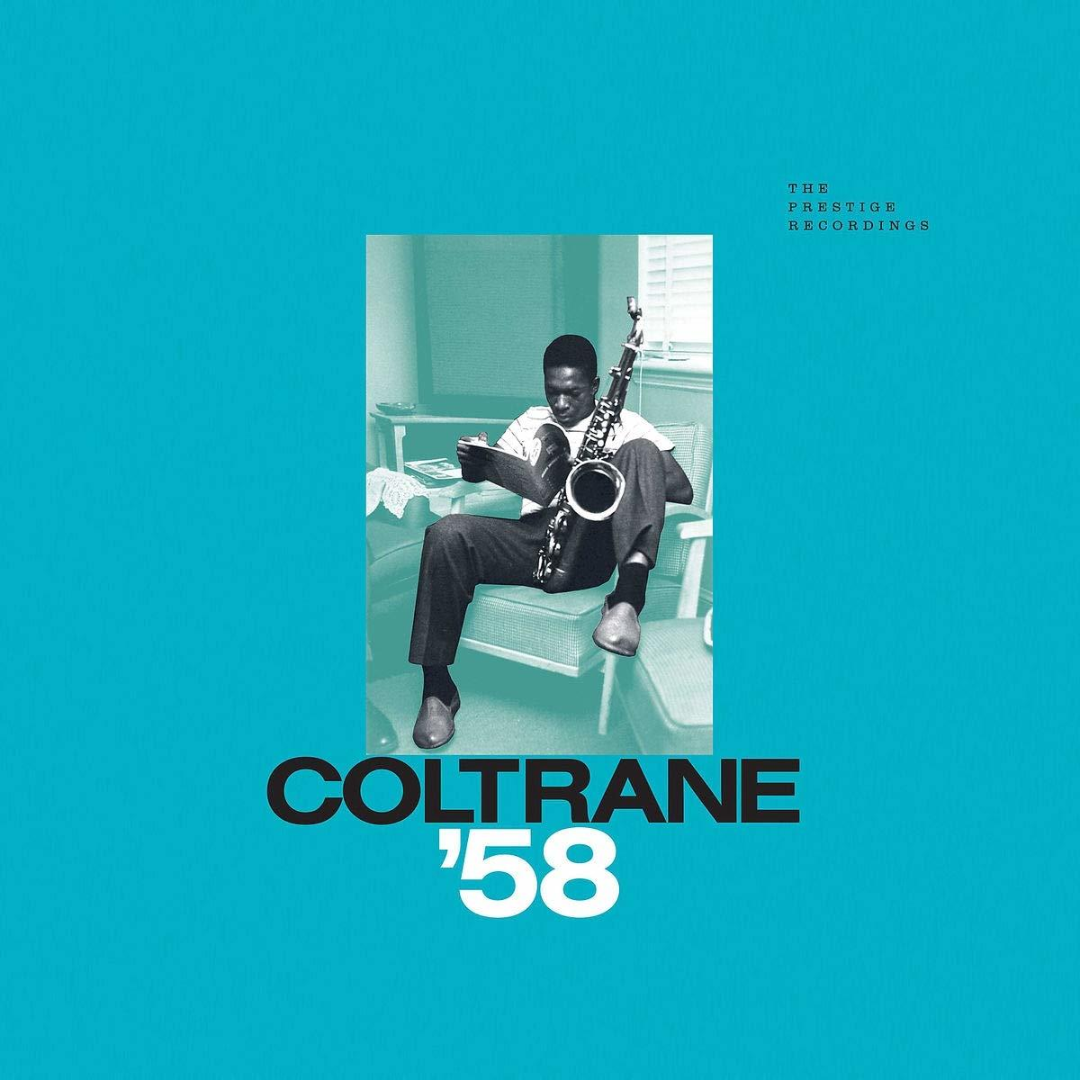 Pochette d'album de jazz avec un homme assis, tenant un saxophone, sur fond bleu.
