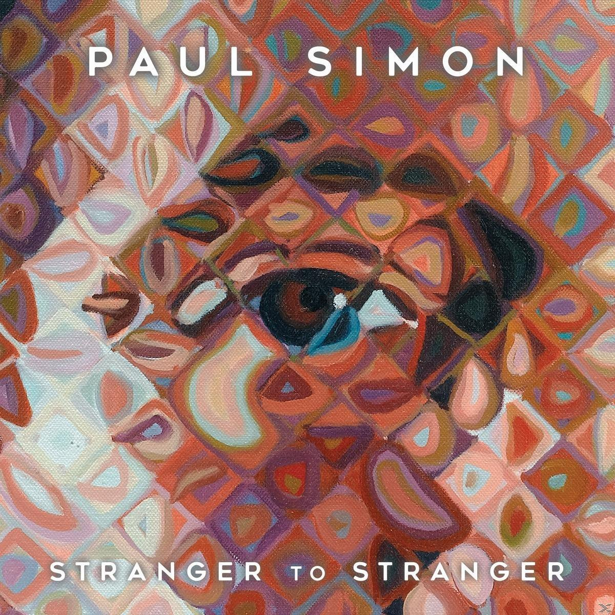 Paul Simon Albumcover. Abstraktes Kunstwerk mit einem Auge. Erdtöne dominieren das Design.