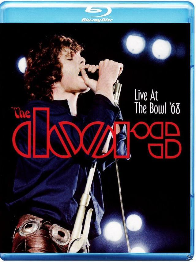 The Doors Live-Auftritt auf der Bühne vor hellen Lichtern. Der Titel lautet Live At The Bowl '68.