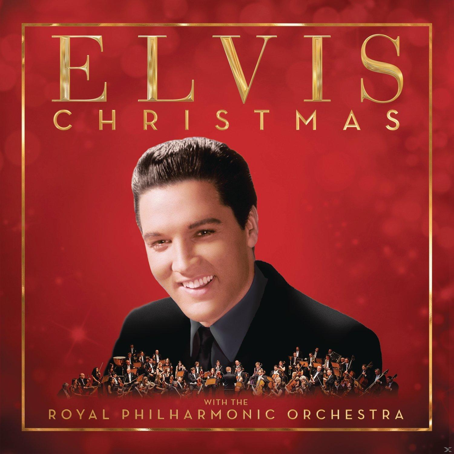 Albumcover: Elvis lächelt vor rotem Hintergrund mit goldenem Text und Orchester.