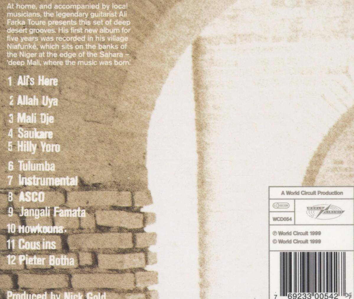 Album hátlapja szöveggel és szám listával: 'Ali Farka Toure', 'A World Circuit Production'.