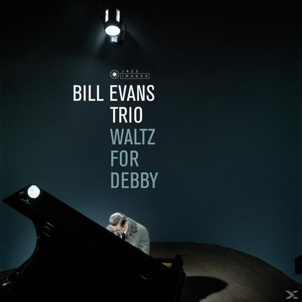 A Bill Evans Trio album borítója. Egy férfi zongorázik a színpadon.