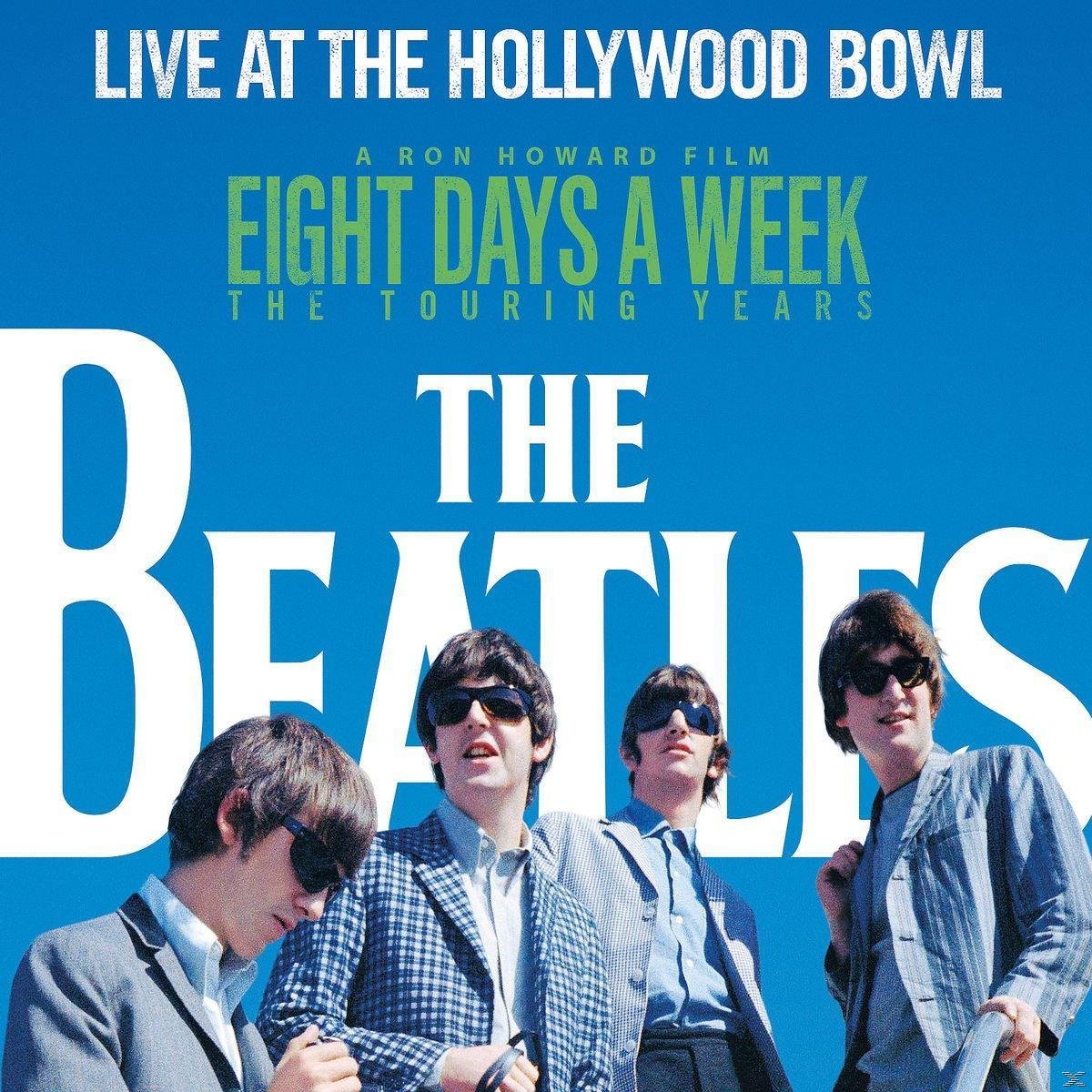 Beatles album borítója: Négy férfi napszemüvegben, a 'Eight Days A Week' és 'The Beatles' cím alatt.