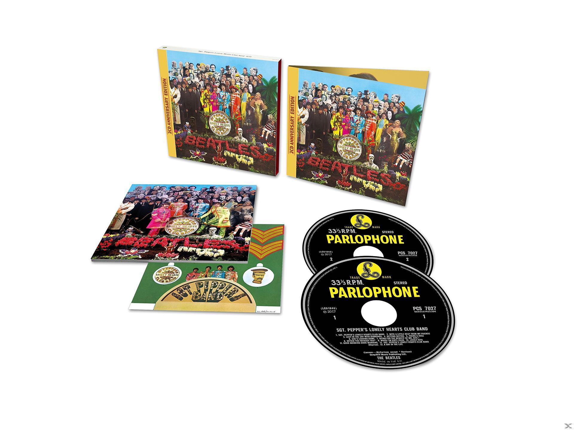 Albumkészlet két CD-vel, borítóval és füzettel. Több ember a borítón és a füzetben.