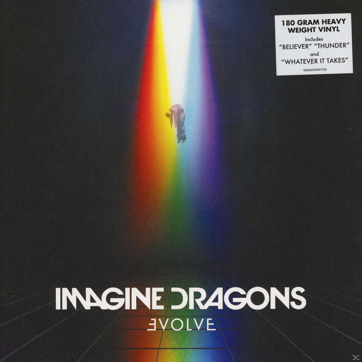 Személy szivárványos fénysugárban, album borító Imagine Dragons logóval.