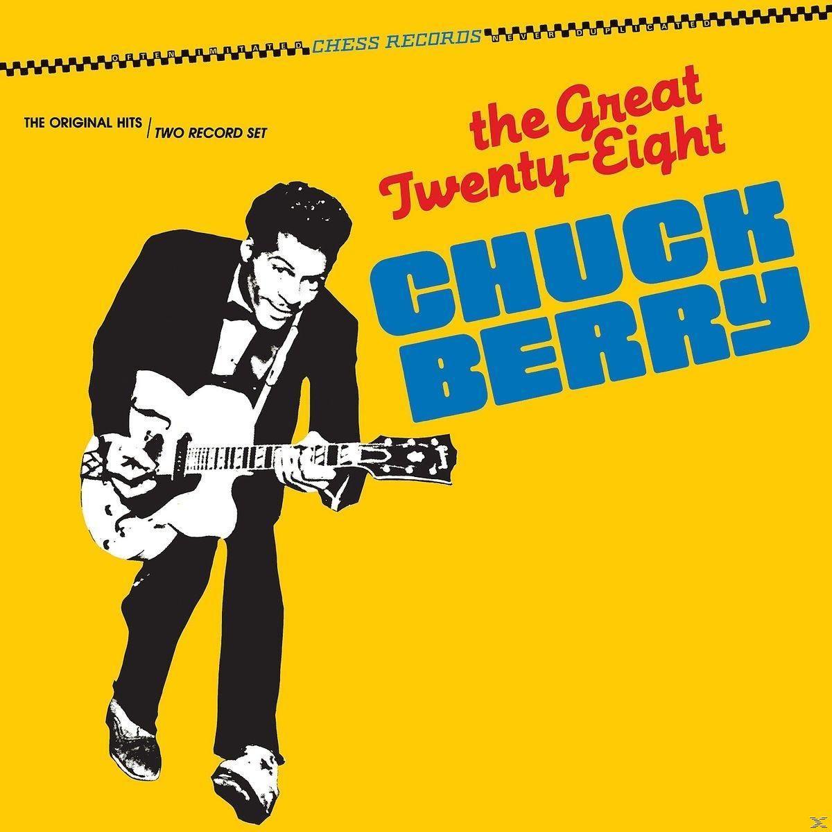 Chuck Berry gitározik sárga háttéren, a 'the Great Twenty-Eight' felirattal.
