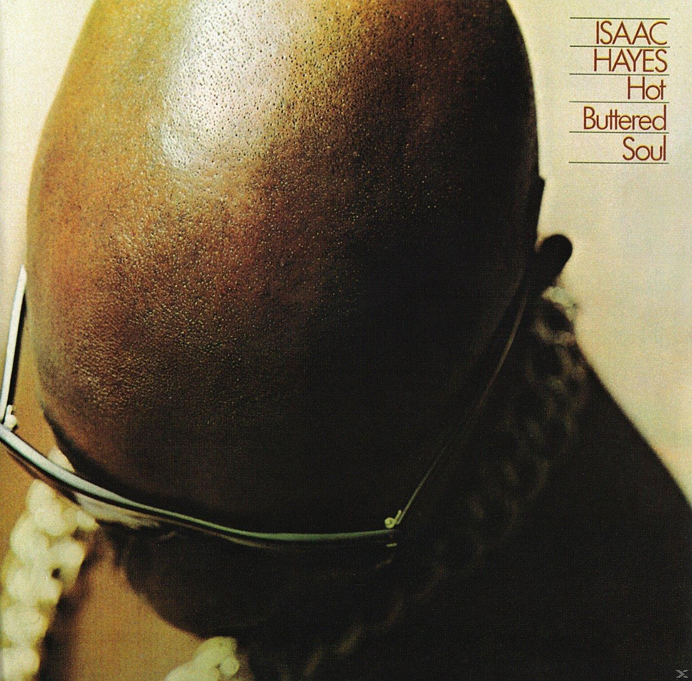 Isaac Hayes Hot Buttered Soul című albumának borítója. Kopasz fej napszemüveggel, szöveg jobb oldalon.