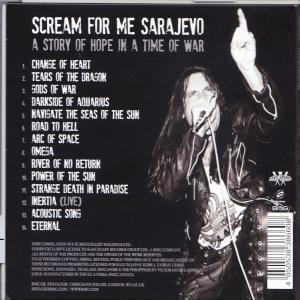 Album borító. Fekete háttér. Férfi énekel mikrofonba, felemelt kézzel, címekkel és számlistával.