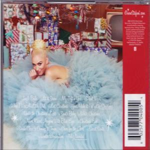 Gwen Stefani CD-borítója. Kék tütüben van, karácsonyi ajándékok veszik körül.