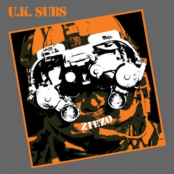 Az U.K. Subs album borítója. Egy katonát ábrázol éjjellátó szemüveggel. Narancssárga és fekete dizájn szürke háttéren. A szöveg: ZIEZO.