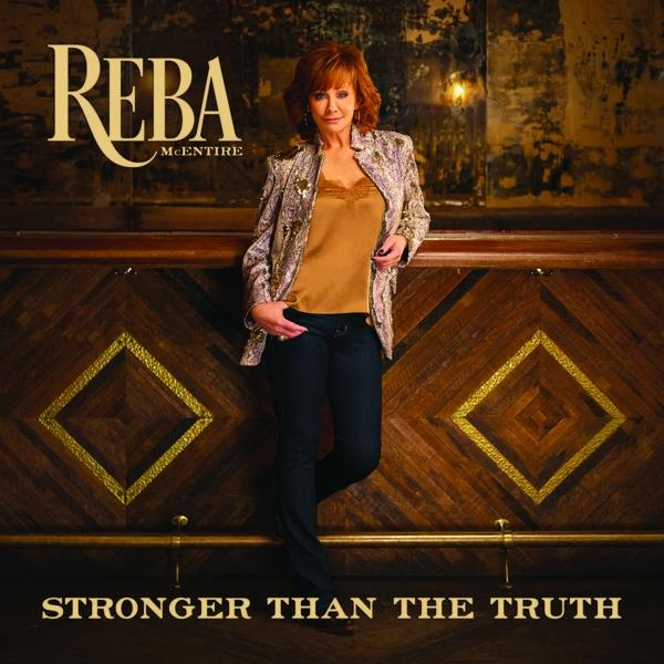 Album borító. Reba McEntire arany toppal és dzsekivel, fa bár előtt áll.