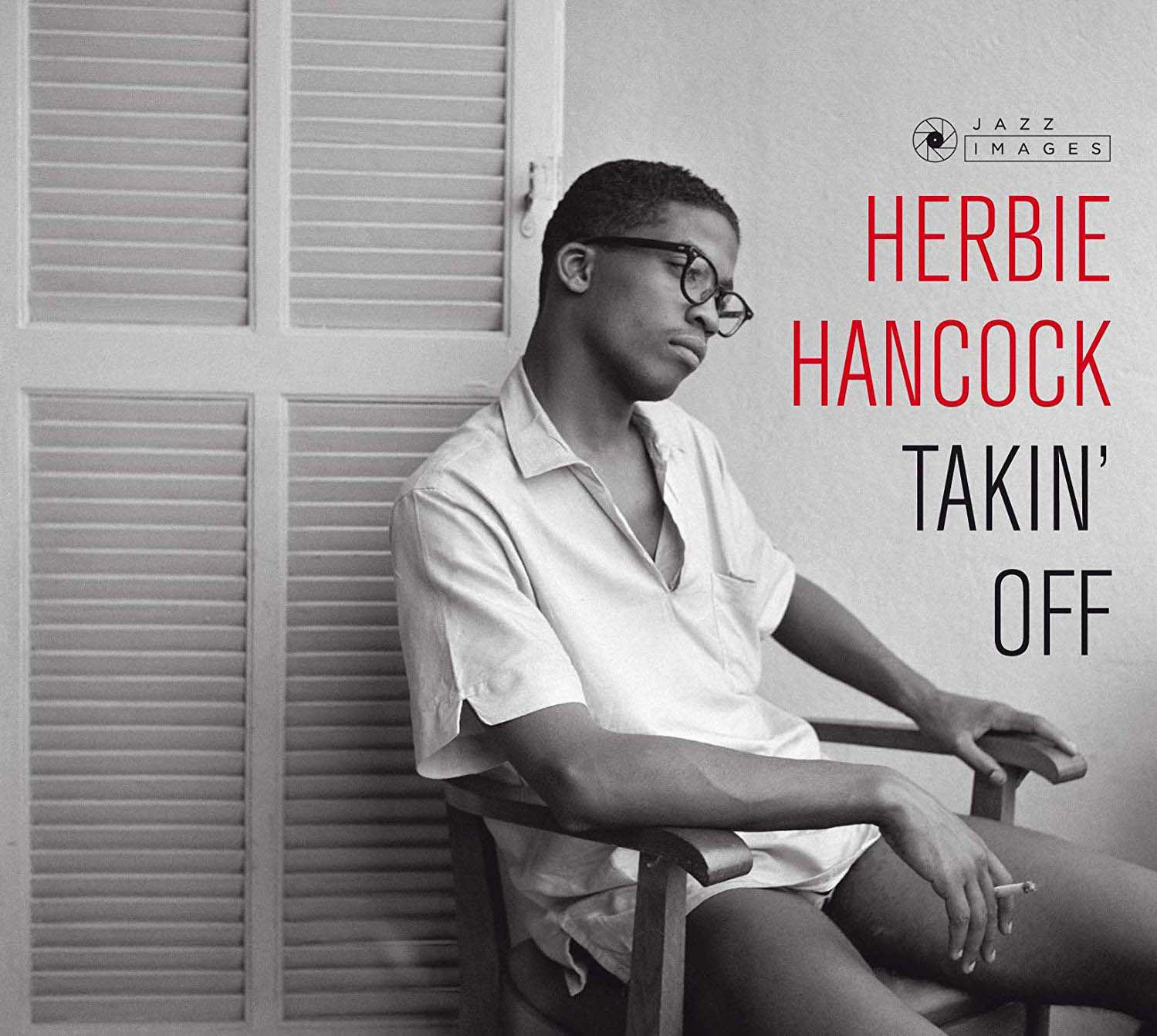 Herbie Hancock Albumcover, ein Mann, der eine Zigarette raucht, sitzt auf einem Stuhl.