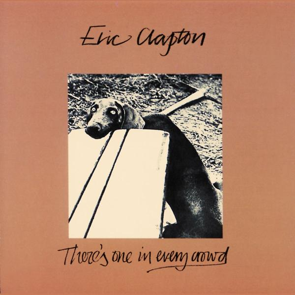 Eric Clapton Albumcover. Ein Hund in einem Bilderrahmen. Brauner Hintergrund mit Titeltext.