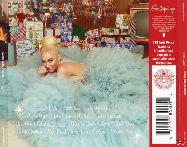 Album borítója. Gwen Stefani kék ruhában, ajándékokkal és karácsonyi dekorációkkal körülvéve. Album címe és számlista.