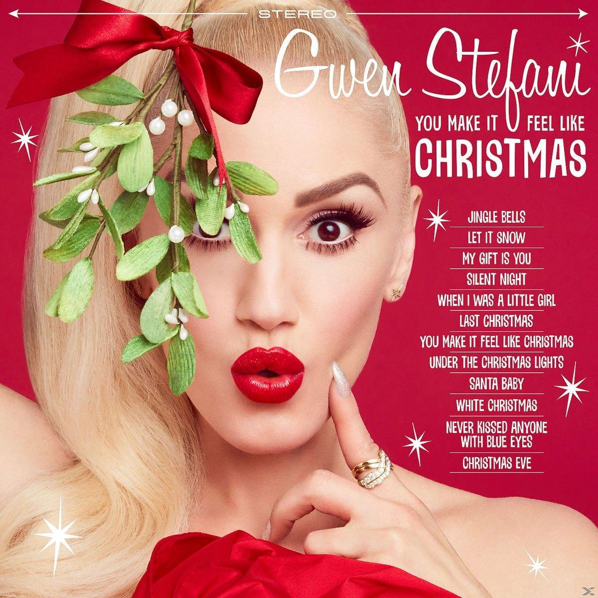Gwen Stefani piros rúzzsal, karácsonyi témával és a dalok címeivel.