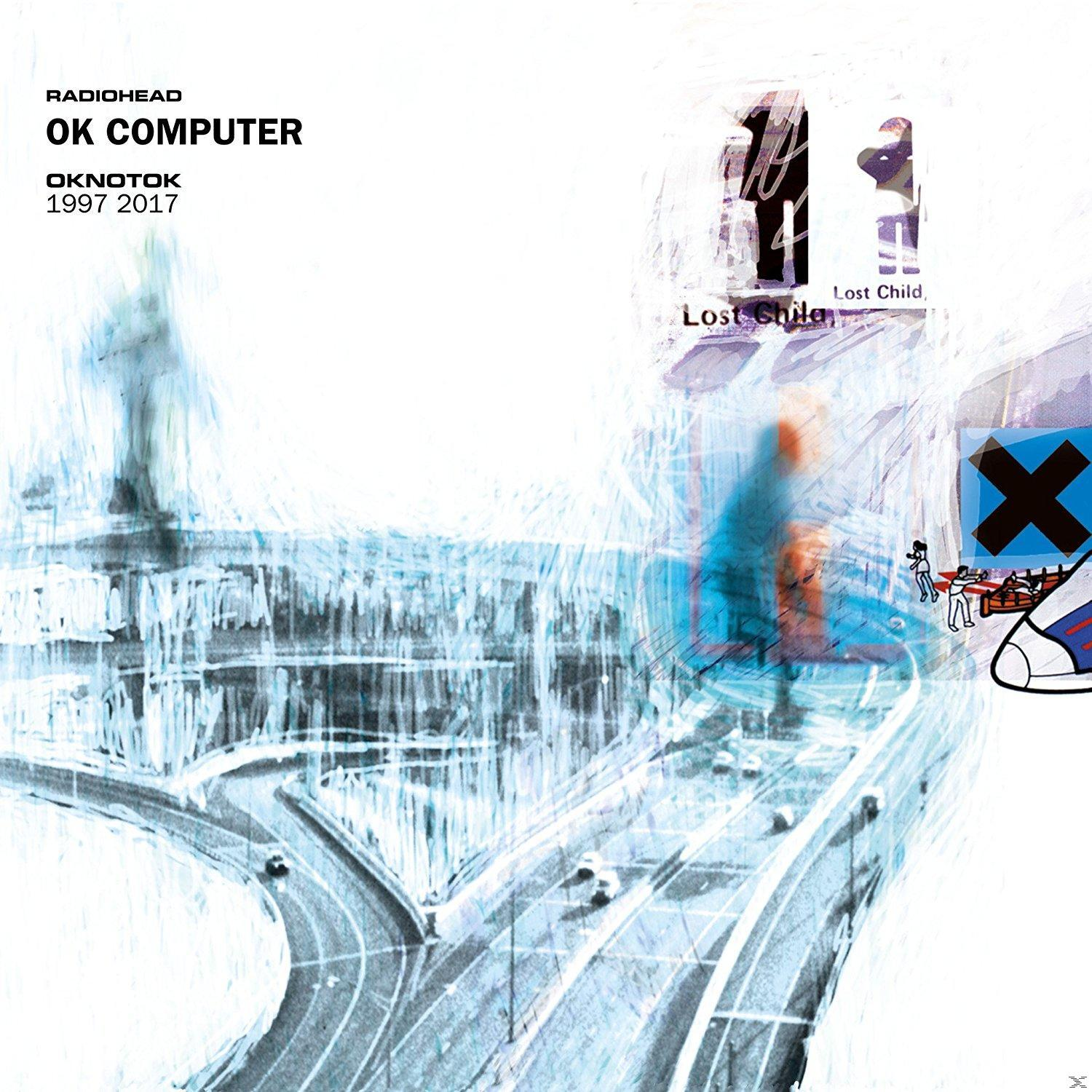 Pochette de l'album 'OK Computer' de Radiohead. Contient de l'art abstrait, du texte et une autoroute.