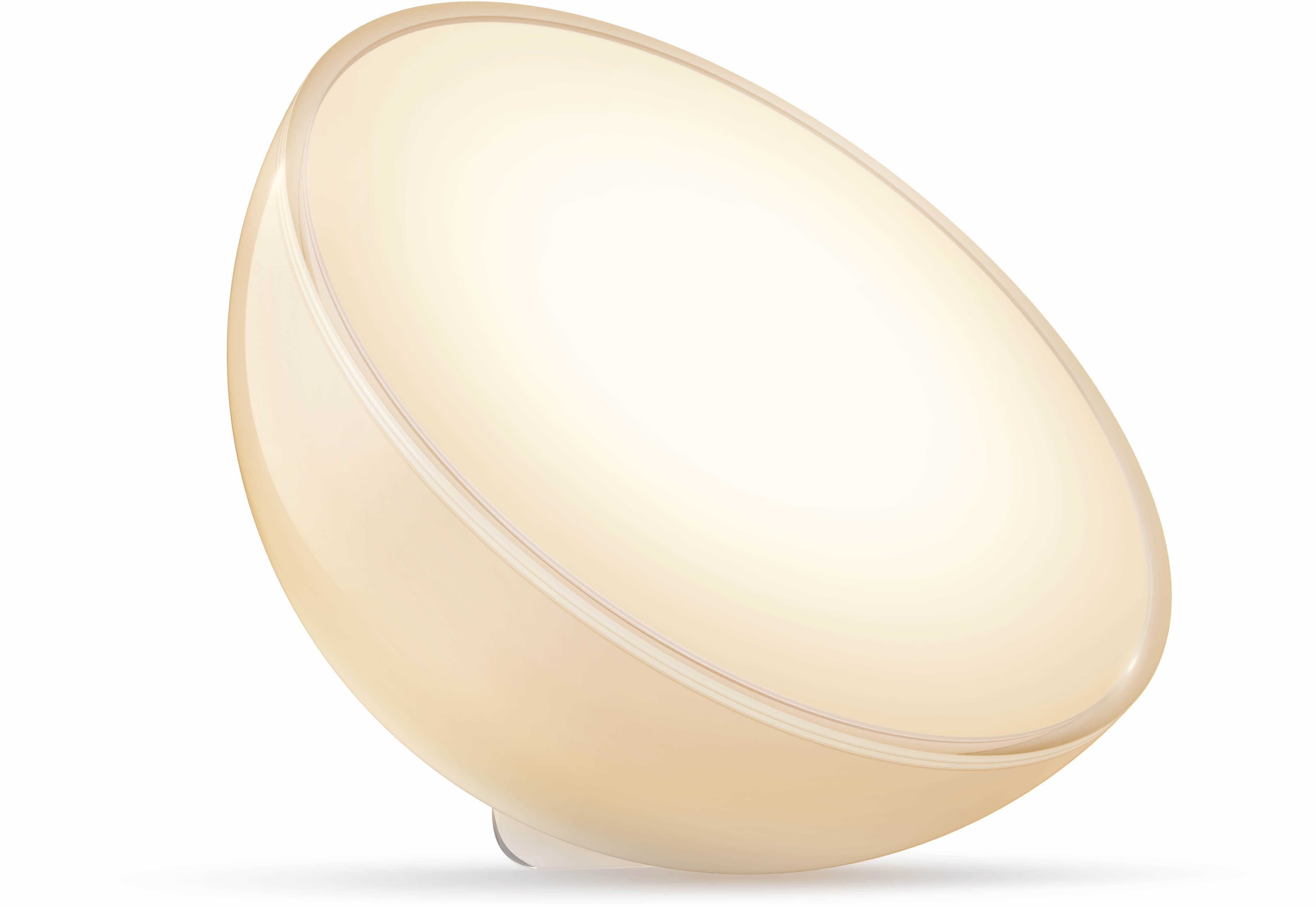 Une lumière blanche et beige en forme d'œuf. Elle est éclairée et sur fond noir.