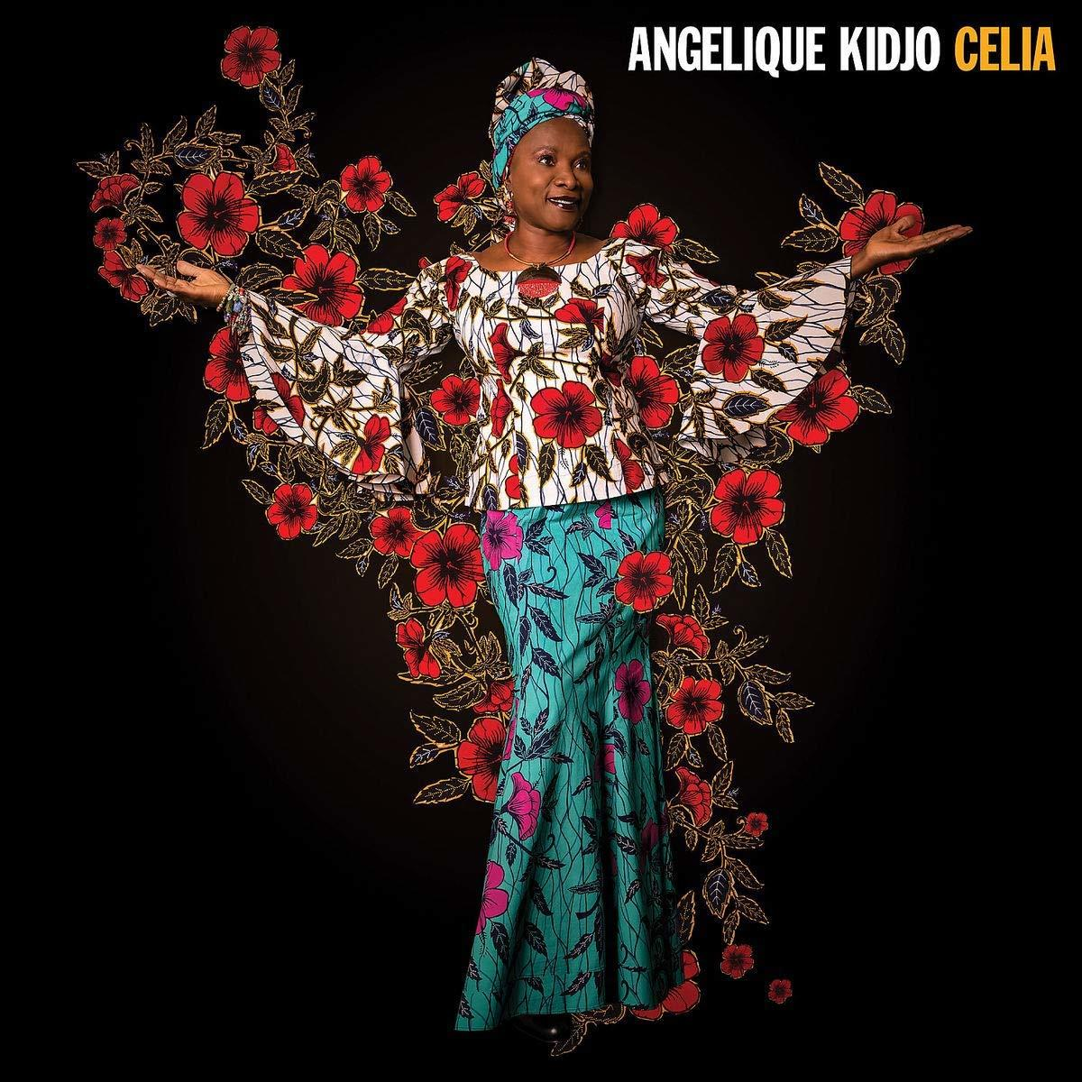 Angelique Kidjo színes ruhában, virágos háttér. Szöveg: Angelique Kidjo Celia.