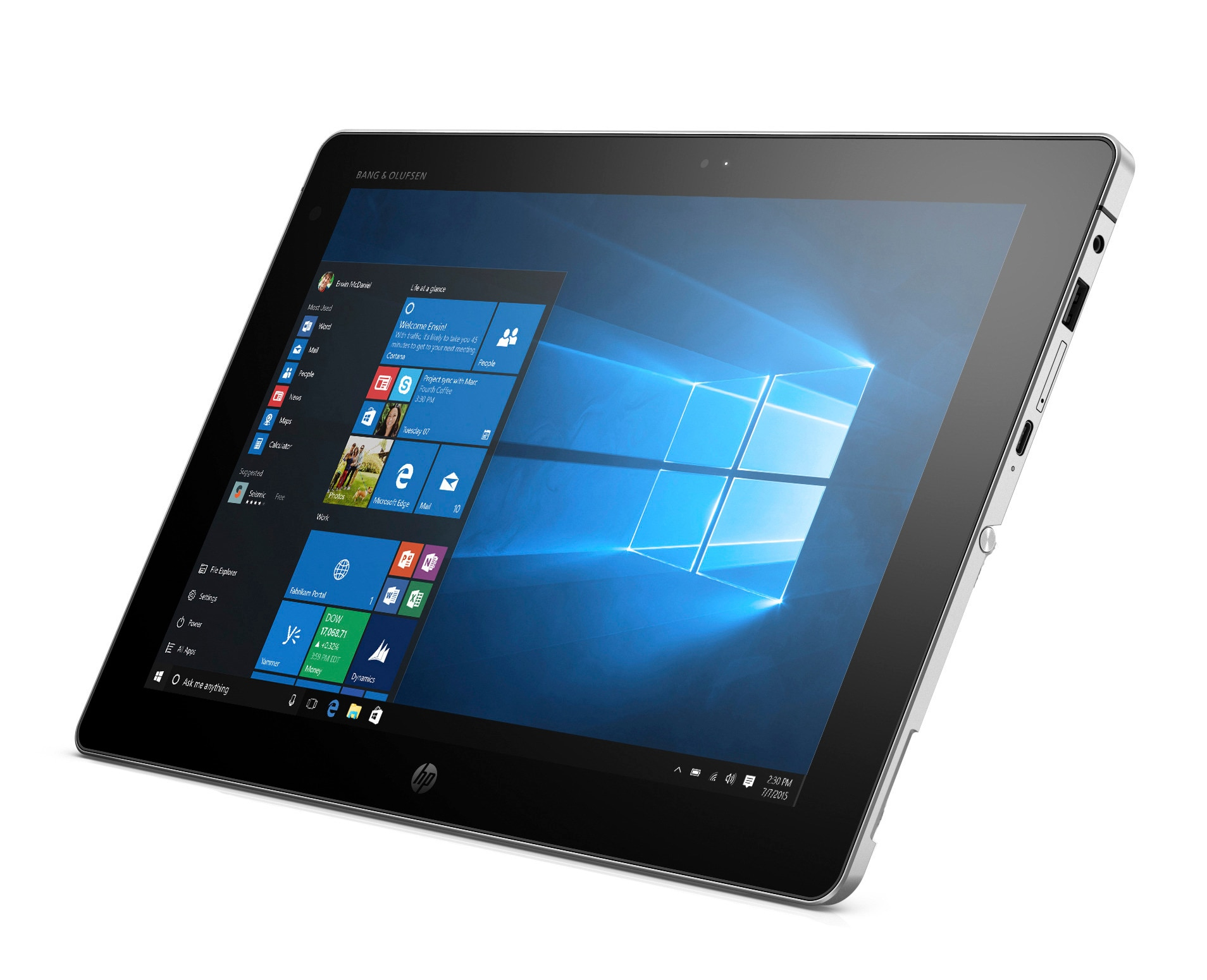 Tableta HP que muestra la interfaz de Windows, apoyada sobre una superficie blanca. La tableta es plateada y negra.