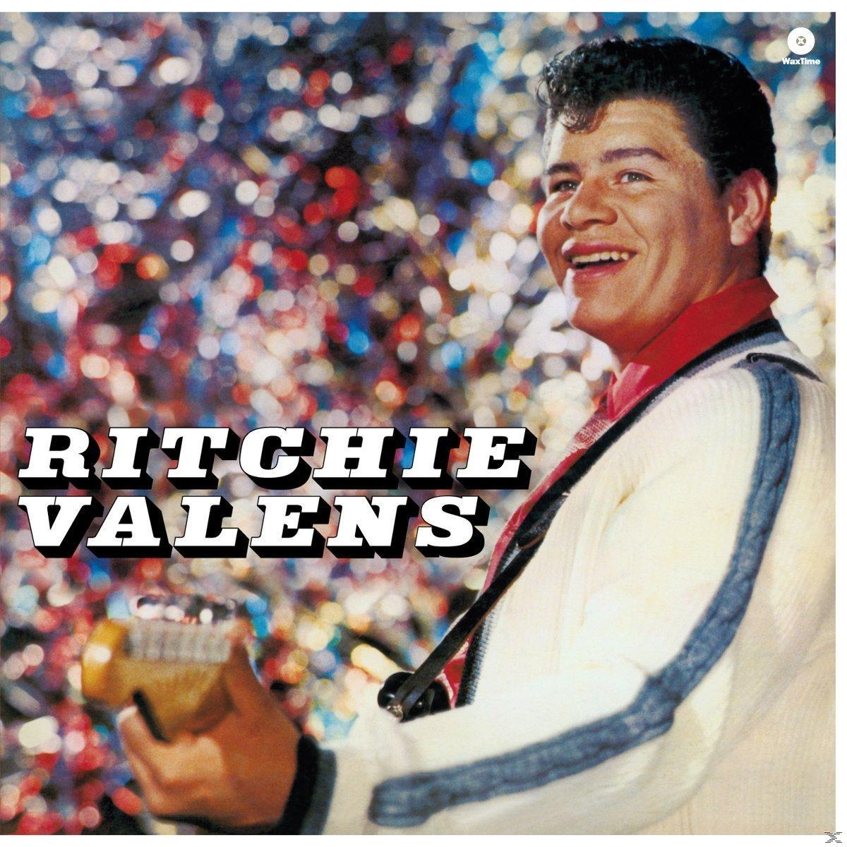 Ritchie Valens albumának borítója. Mosolyog, gitárt tart. Színes konfetti háttér.