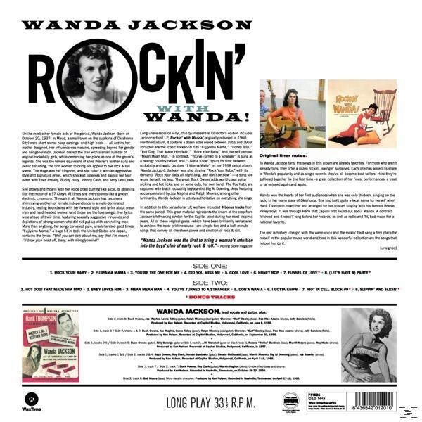 Album borítója egy nő fotójával. A művész Wanda Jackson. Cím: Rockin' with Wanda! Szöveg és dalcímek listázva.