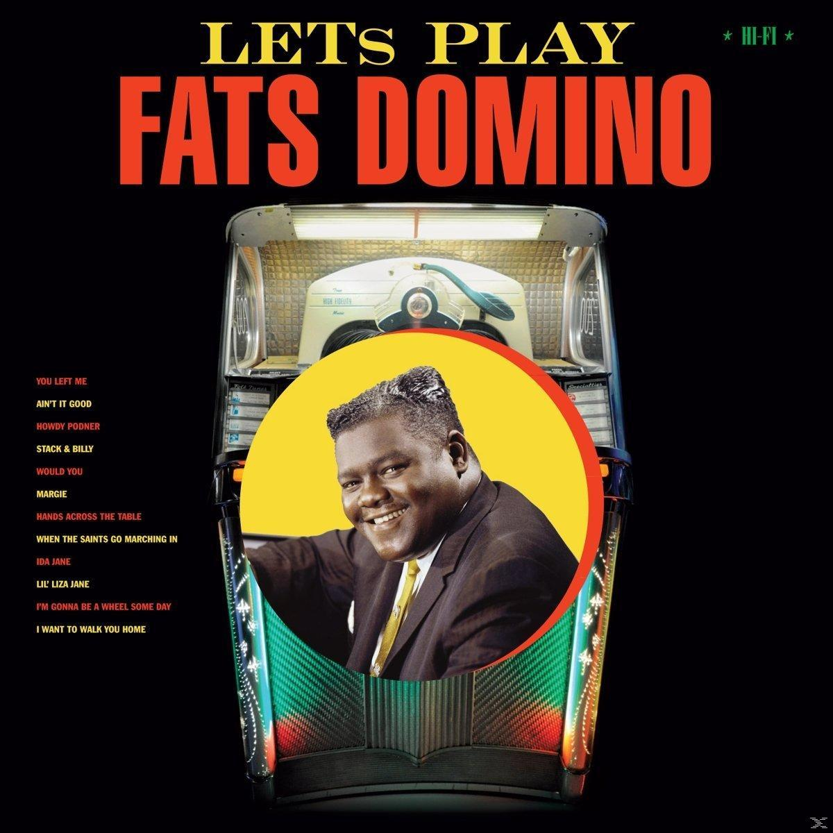Album borító: Fats Domino. Az énekes egy zenegépben. Fekete háttér. A cím piros. A zenegép a fókusz.