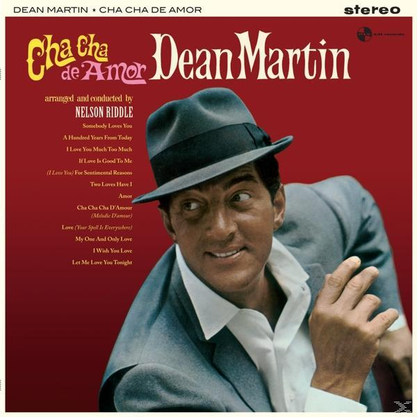 Album borító: Dean Martin Cha Cha de Amor. Mosolygó férfi öltönyben, piros háttér, zenejegyek.