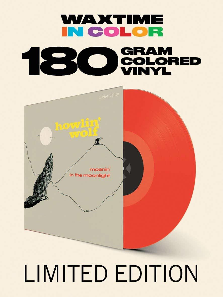 Vinil lemez piros koronggal és album borítóval, farkas rajzzal, bézs háttér előtt.