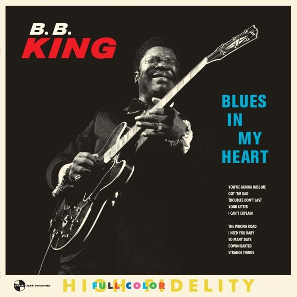 Album borító: B.B. King. King gitározik, szöveggel fekete háttéren. Kék szöveg.