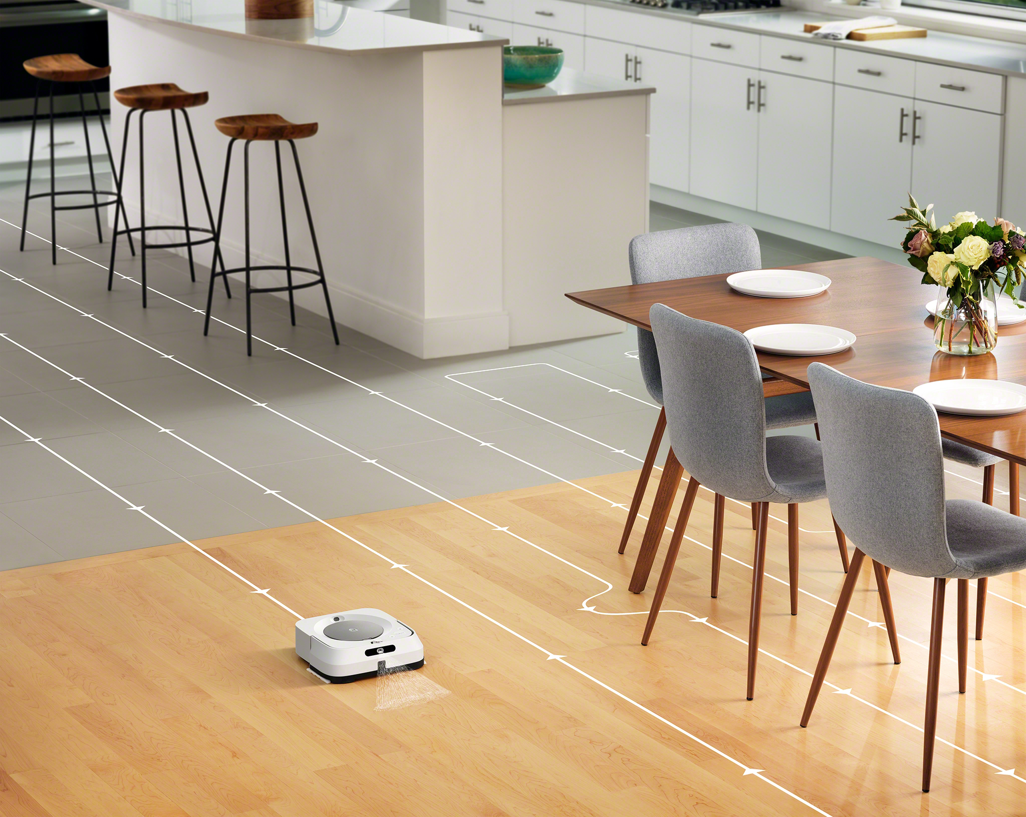 A robot vacuum cleaner cleaning a floor with a planned path marked on it.