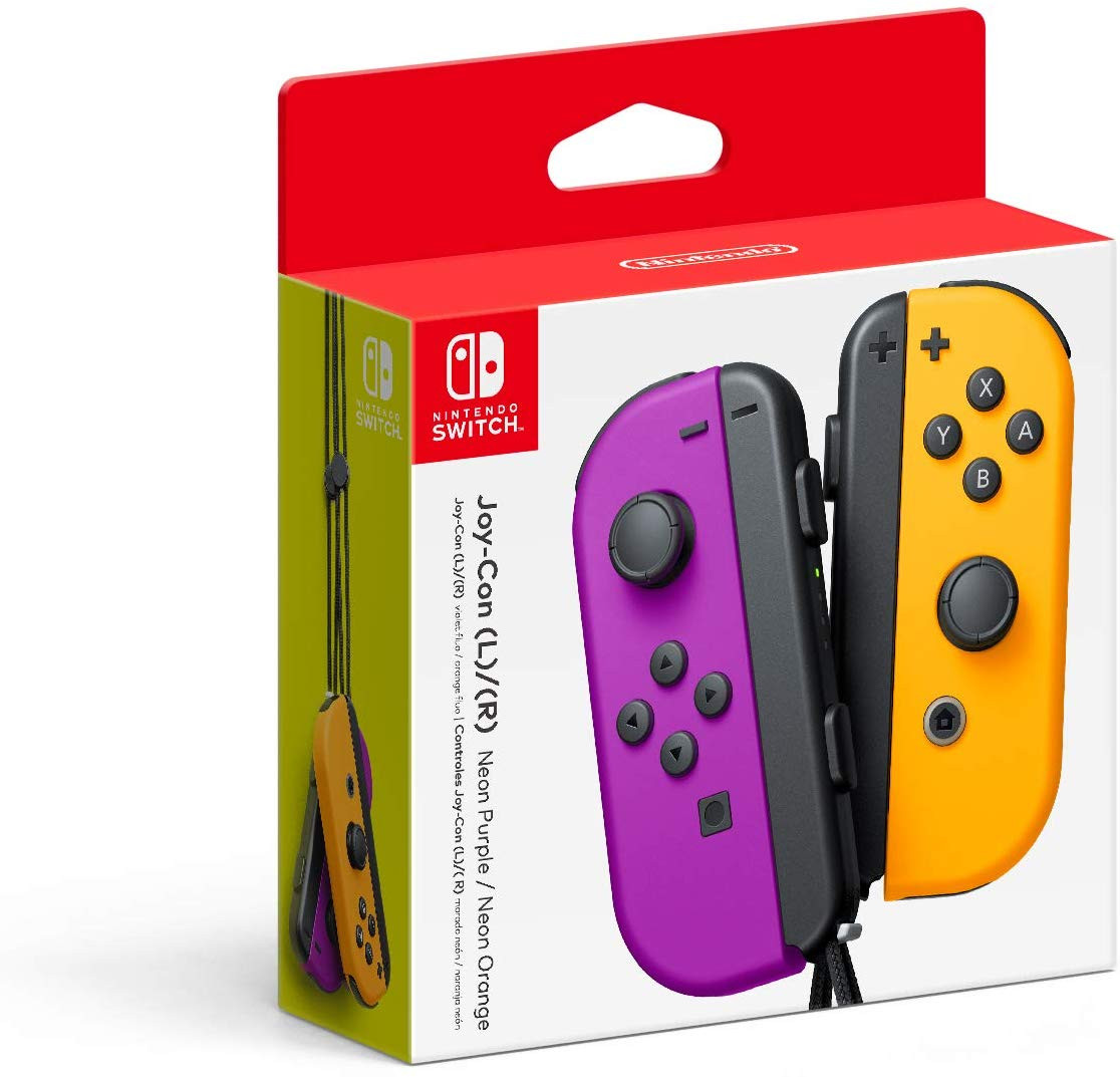 Boîte de manettes Nintendo Switch Joy-Con. Une paire est violette et jaune. La boîte a un design rouge et blanc.