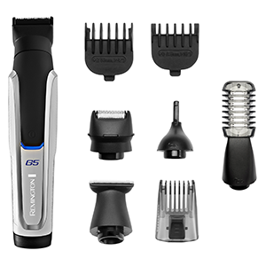 A black and silver electric beard trimmer with various trimming attachments.