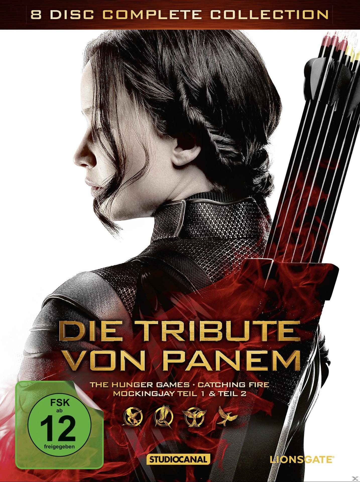 DVD-Cover mit Frau, die Pfeile hält und Flammenhintergrund, Titel 'Die Tribute von Panem'.